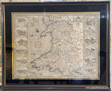 Load image into Gallery viewer, Antique map of Wales with illustrations and original coloring in blue, red, orange. Framing is black and gold. Genuine-Antique-Map-Framed-Wales-1611-Speed-Maps-Of-Antiquity