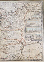Load image into Gallery viewer, Framed antique map of Russia with decorative elements, slightly faded original color in red, orange, blue, yellow. Framing is black and gold.
