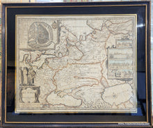 Load image into Gallery viewer, Framed antique map of Russia with decorative elements, slightly faded original color in red, orange, blue, yellow. Framing is black and gold. Genuine-Antique-Map-Framed-A-Map-of-Russia-1676-Speed-Maps-Of-Antiquity