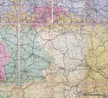 Load image into Gallery viewer, Close-up of part of the Antique map of Germany and surrounding with Prague and Vienna. ANtique tones of green, pink, yellow, orange, purple to indicate political boundaries.