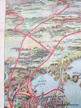 Load image into Gallery viewer, Antique bird's-eye view of part of Casco Bay in Maine with chromolithograph colors in blues, greens, reds, and purples. Red lines show the train routes. Black lines show ferry routes. Portland is on the left side and Mount Washington is in the distance. The islands of Casco Bay are in the foreground.