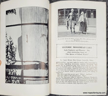 Load image into Gallery viewer, Open book with black and white photographs and text about Moosehead Lake.