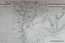 Load image into Gallery viewer, Close up on the city of tokyo with streets and the castle as it was in 1889. antique sailing nautical chart of tokyo bay Japan.