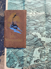 Load image into Gallery viewer, Antique Bird's-eye view map of lake Winnipesaukee in New Hampshire with the White Mountains in the distance. Chromolithograph with blue coloring.