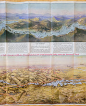 Load image into Gallery viewer, Antique folding map with a bird's-eye view map of Lake George, New York, at the top in colored of blues, greens, and purples, and a slightly larger bird's-eye view map of Lake Champlain and Lake George at the bottom in colors of yellow, green, blue, and red. Coloring is sophisticated chromolithograph color and shows the majestic mountains and hills around the lakes. Maps also include towns, railroads, and more. Text is printed around the outside of the maps with visitor information.