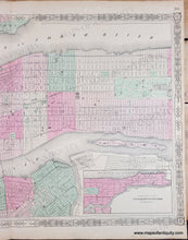 Load image into Gallery viewer, Antique map of the southern part of Manhattan with part of Brooklyn and Jersey City in original color in tones of pink, green, yellow, and orange delineating wards and parks