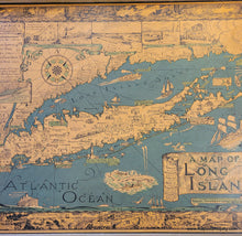 Load image into Gallery viewer, Vintage illustrated map of Long Island in colors of blue, tan, and orange, slightly faded. The map is very flat because it is affixed to a board and framed in a raw wood hand-made frame.