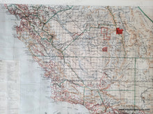Load image into Gallery viewer, Antique map with original printed-color in blue for the water, green for boundaries- counties and state- red for reservations, national parks, Surveyor and land offices, brown for topography. In two separate sheets- one is the north half and one is the south half. close up
