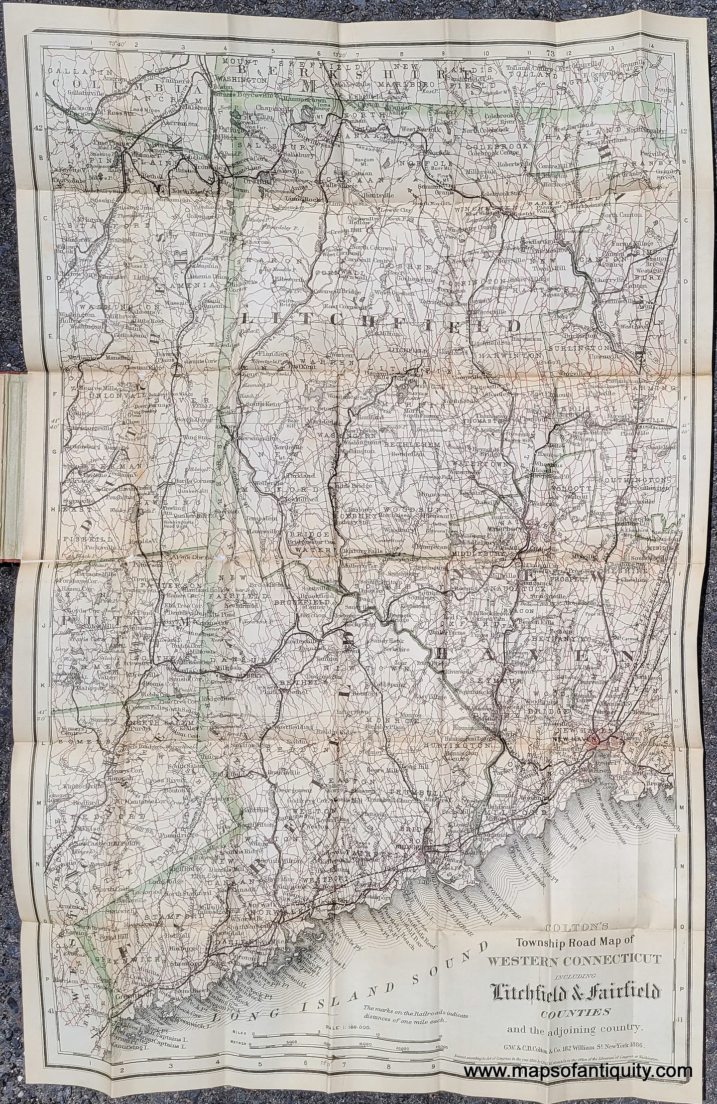 Folding map of Fairfield and Litchfield Counties in Connecticut with the surrounding areas including part of Westchester and Dutchess Counties in NY