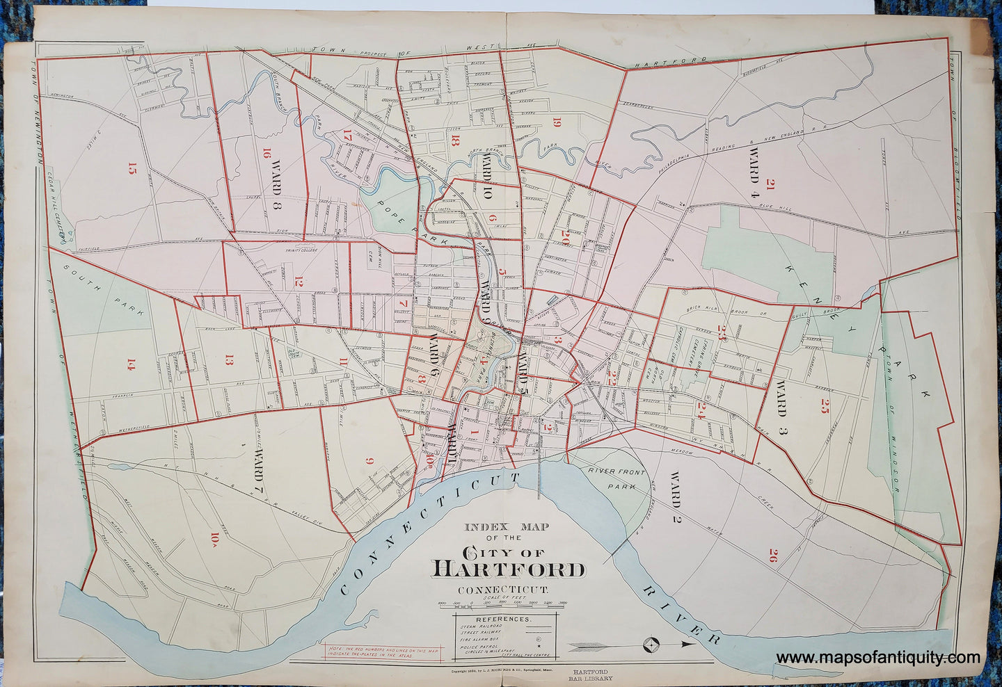 Genuine antique map of the city of Hartford Connecticut. This is the index map for the atlas. It is colored in antique tones of red, pink, yellow, green, and blue.