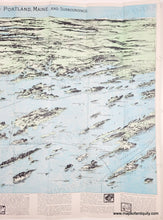 Load image into Gallery viewer, A vintage map 'Bird's Eye View of Casco Bay, Portland, Maine, and Surroundings,' showing illustrated coastlines, islands, and water in pale blue, green, and beige tones, with printed text panels along the bottom.
