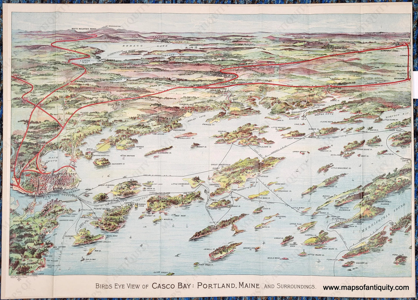 Antique bird's-eye view of part of Casco Bay in Maine with chromolithograph colors in blues, greens, reds, and purples. Red lines show the train routes. Black lines show ferry routes. Portland is on the left side and Mount Washington is in the distance. The islands of Casco Bay are in the foreground.