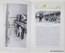 Load image into Gallery viewer, Open book with black and white photographs and text on a white background. Pages from booklet about Martha's Vineyard
