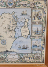 Load image into Gallery viewer, Antique map showing the town of Marblehead, Massachusetts, at center with illustrations of notable buildings and notable ships in the sea. Surrounding the map are scenes historical events and local industries like fishing. Colors of buttery light yellow, green, and light blue. Decorative scrollwork, fishes, lobsters, and the town seal. Framed in a vintage medium-tone wood frame
