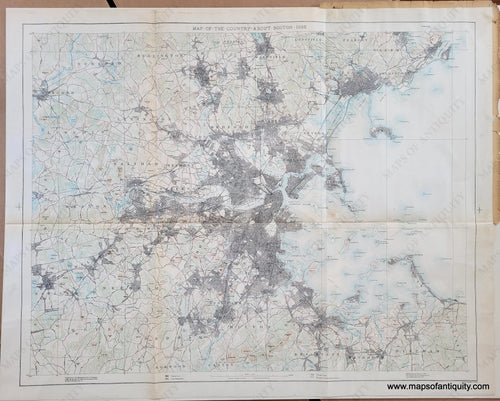 Impressive map with the city of Boston at center, with darkly shaded areas indicating densely populated areas, green shows forests and brown lines indicate topography. The Public Reservations are noted.