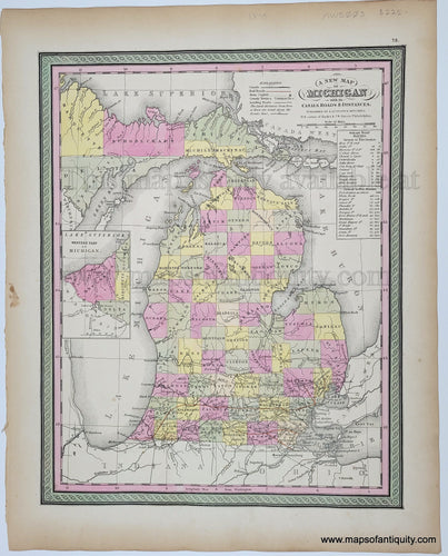 Antique Map of Michigan USA with original hand-coloring in tones of green, yellow, peach, and pink. 1849 Mitchell