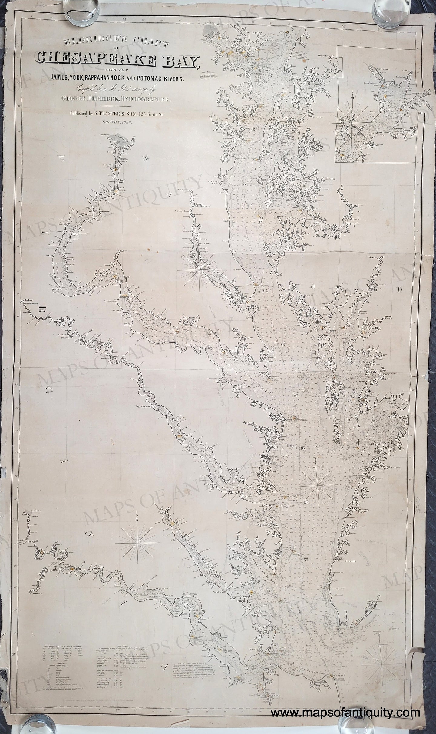 Large Antique sailing chart of Chesapeake Bay with water depths, cities, coastlines. small spots of original color indicates lighthouses.