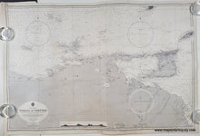 Load image into Gallery viewer, Old sailing chart of the Venezuela coast with the islands of trinidad, tobago, tortuga. Black and white with small bits of color to indicate lighthouses/buoys
