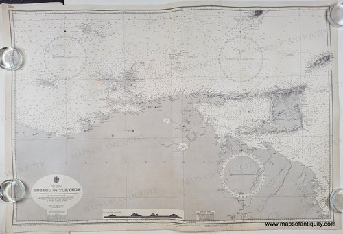 Old sailing chart of the Venezuela coast with the islands of trinidad, tobago, tortuga. Black and white with small bits of color to indicate lighthouses/buoys