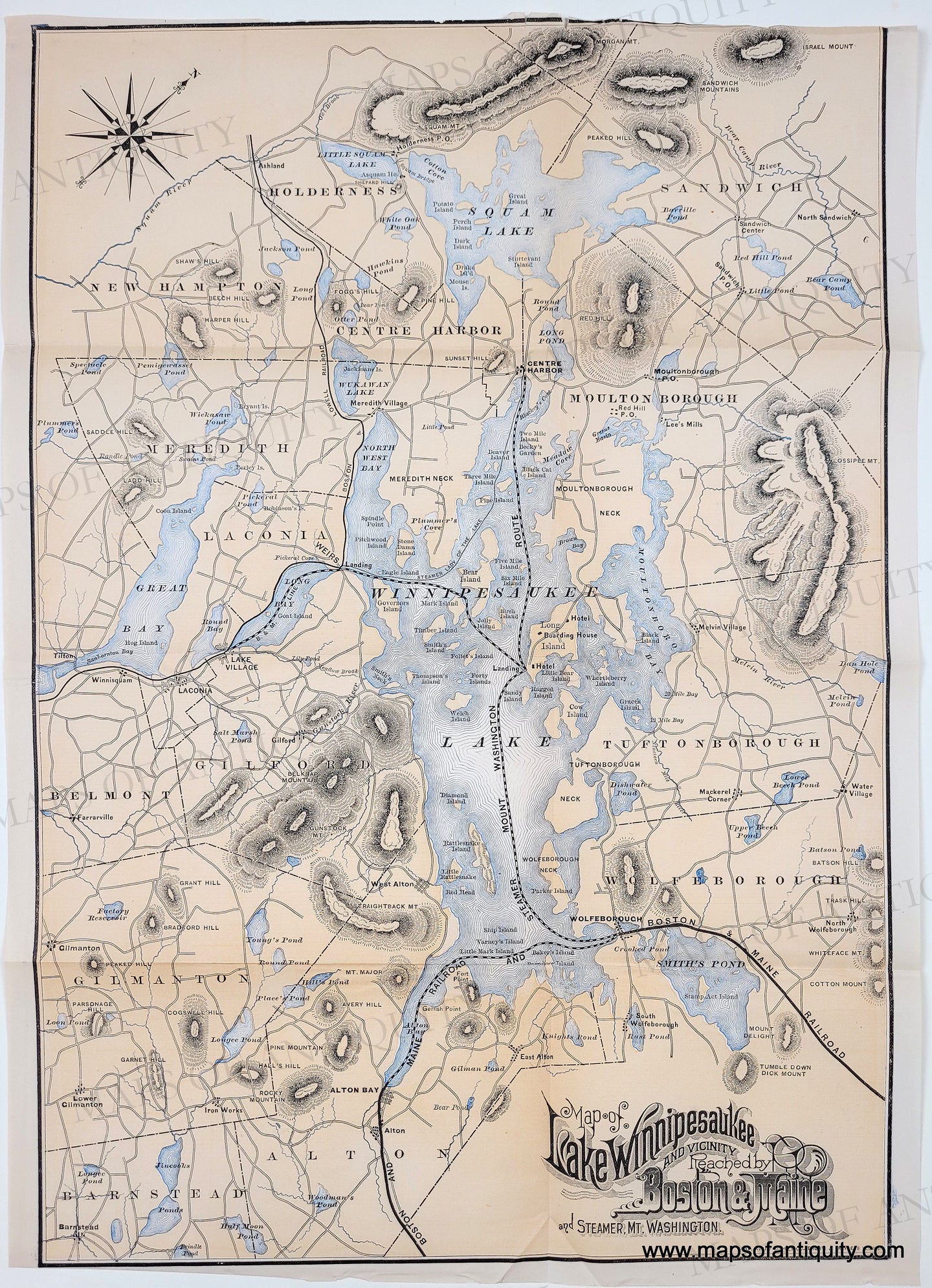 Antique map of Lake Winnipesaukee with a yellow tan color for the land and blue for the water. details of topography, towns, roads. Genuine-Antique-Map-Map-of-Lake-Winnipesaukee-and-Vicinity-reached-by-Boston---Maine-and-Steamer-Mt-Washington--1887-Rand-Avery-Supply-Boston-Maine-Railroad-Maps-Of-Antiquity