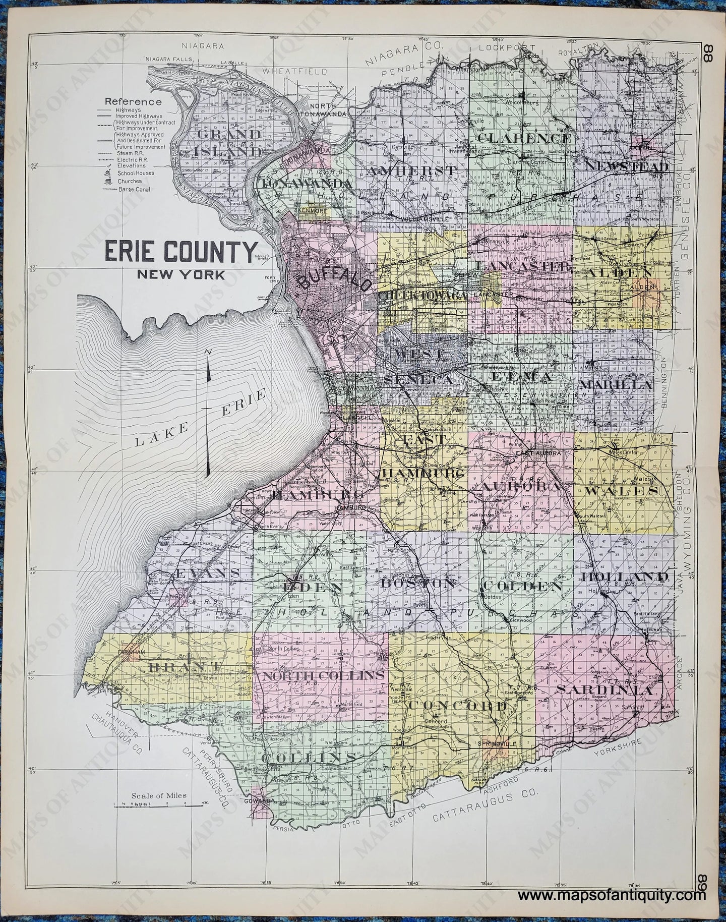 Antique map of Erie County New York, NY, colored by town in antique tones of pink, green, yellow, purple, and showing railroads, highways, proposed highways, cities, villages, etc. Published in 1911.