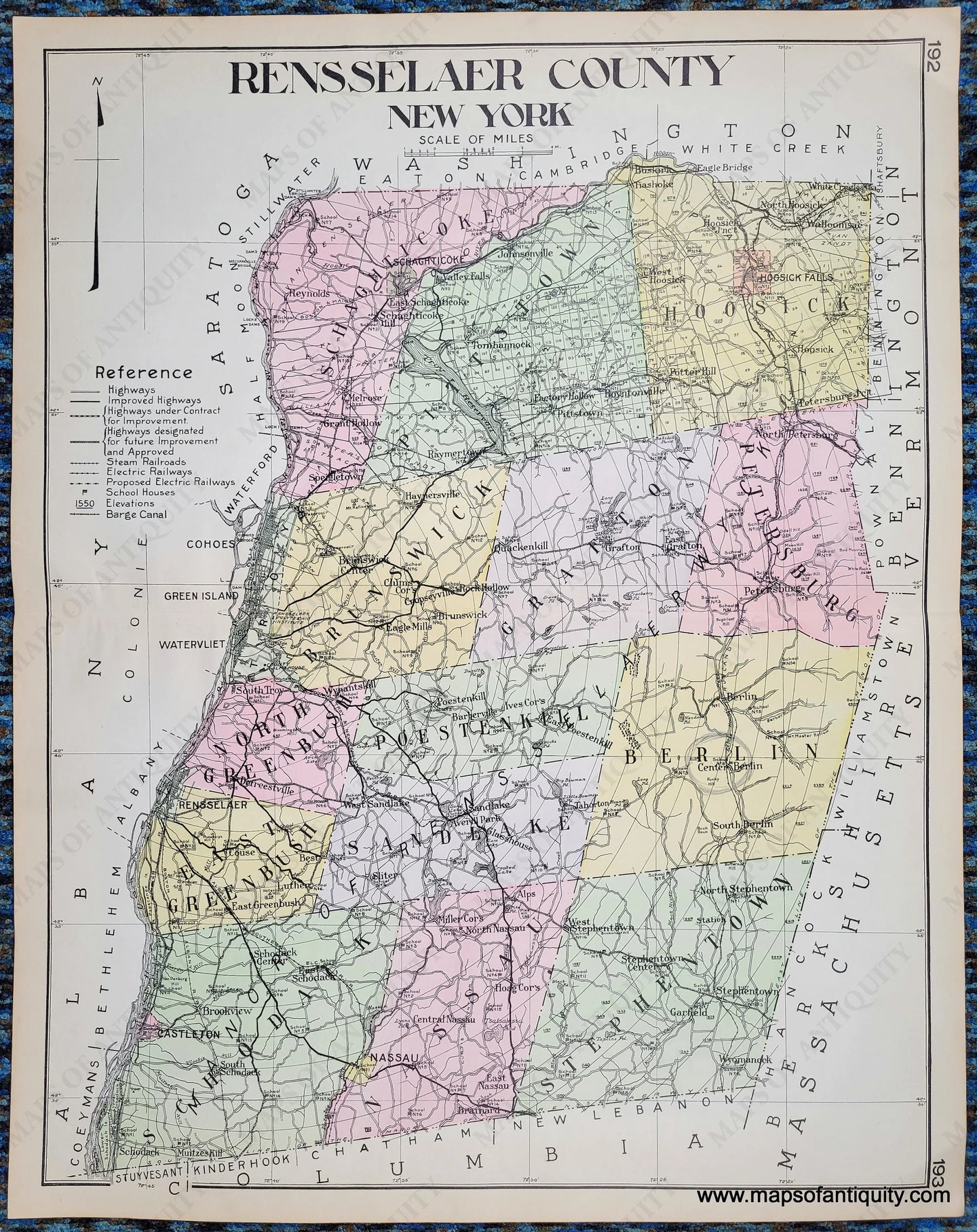 Antique map of Rensselaer County New York, NY, colored by town in antique tones of pink, green, yellow, purple, and showing railroads, highways, proposed highways, cities, villages, etc. Published in 1911.