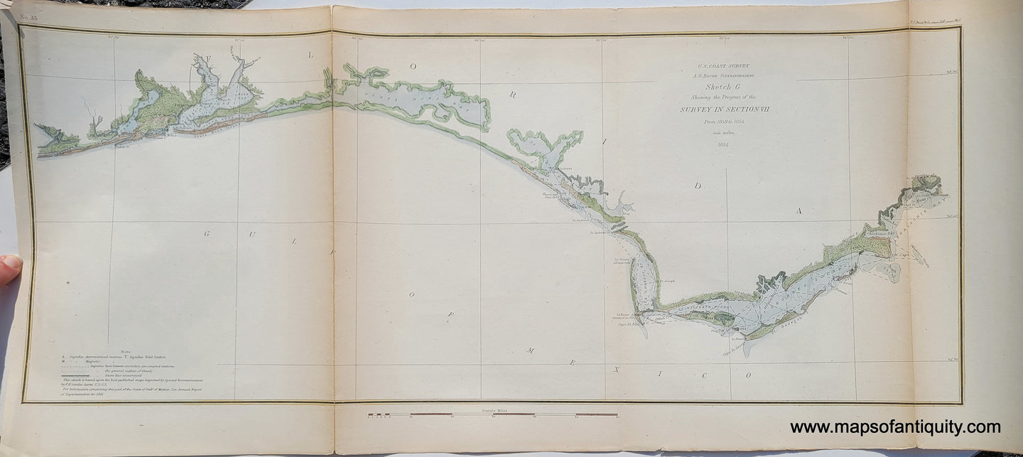 Antique Triangulation chart of the Florida Coast along the pan handle including Pensacola, St ANdrews Bay, Apalachicola, etc. This map has recent color with greens and browns along the coast and light blue in the water along the coast. Authentic antique from 1854 map.