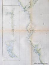 Load image into Gallery viewer, Close-up of part of the coast survey chart of Florida, 1860, showing the west coast and two inset maps. Light green color along the coast and light blue in the water along the coast.
