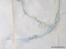 Load image into Gallery viewer, Close-up of part of the coast survey chart of Florida, 1860, showing the south coast and Florida Keys. Light green color along the coast and light blue in the water along the coast.

