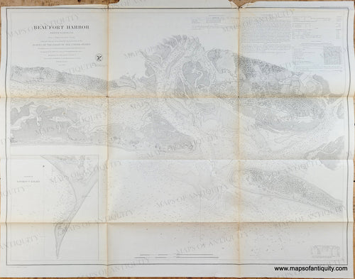 Black and white chart of the area near Beaufort NC with great detail in the water and coastal areas. It has folds from being published in a book. 