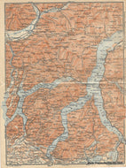 Antique map of the Lake Como Italy region with rivers and topography. Original color in muted orange for topography and blue for water. 1909