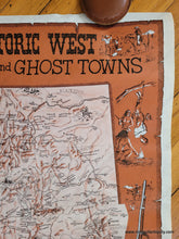 Load image into Gallery viewer, Pictorial map in the style of an old west poster bulletin. Orange-brown color along with black and white. Large map at the center shows the entire western half of the United States with lots of information and some illustrations. The Legend shows Ghost Towns, Old Mines, Military Posts, Lost Mines, and Missions. Dramatic illustrations surround the map including a rifle and a skull with a hole in the forehead.
