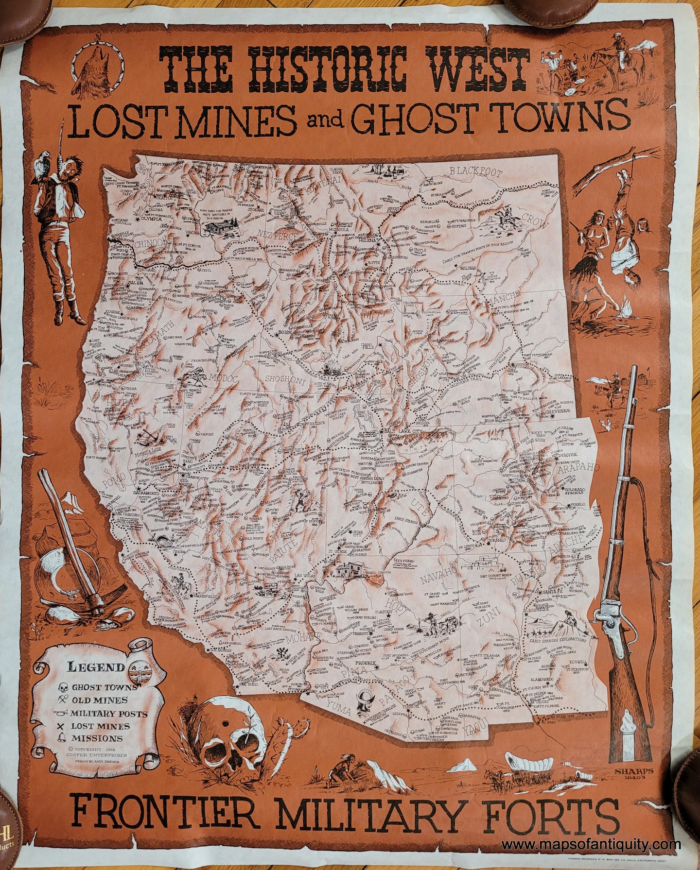 Pictorial map in the style of an old west poster bulletin. Orange-brown color along with black and white. Large map at the center shows the entire western half of the United States with lots of information and some illustrations. The Legend shows Ghost Towns, Old Mines, Military Posts, Lost Mines, and Missions. Dramatic illustrations surround the map including a rifle and a skull with a hole in the forehead. 