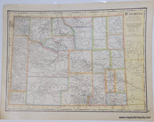 Load image into Gallery viewer, Antique map of Wyoming with original printed color. The color indicates the county borders and is in antique tones of green, pink, orange, yellow, and blue.
