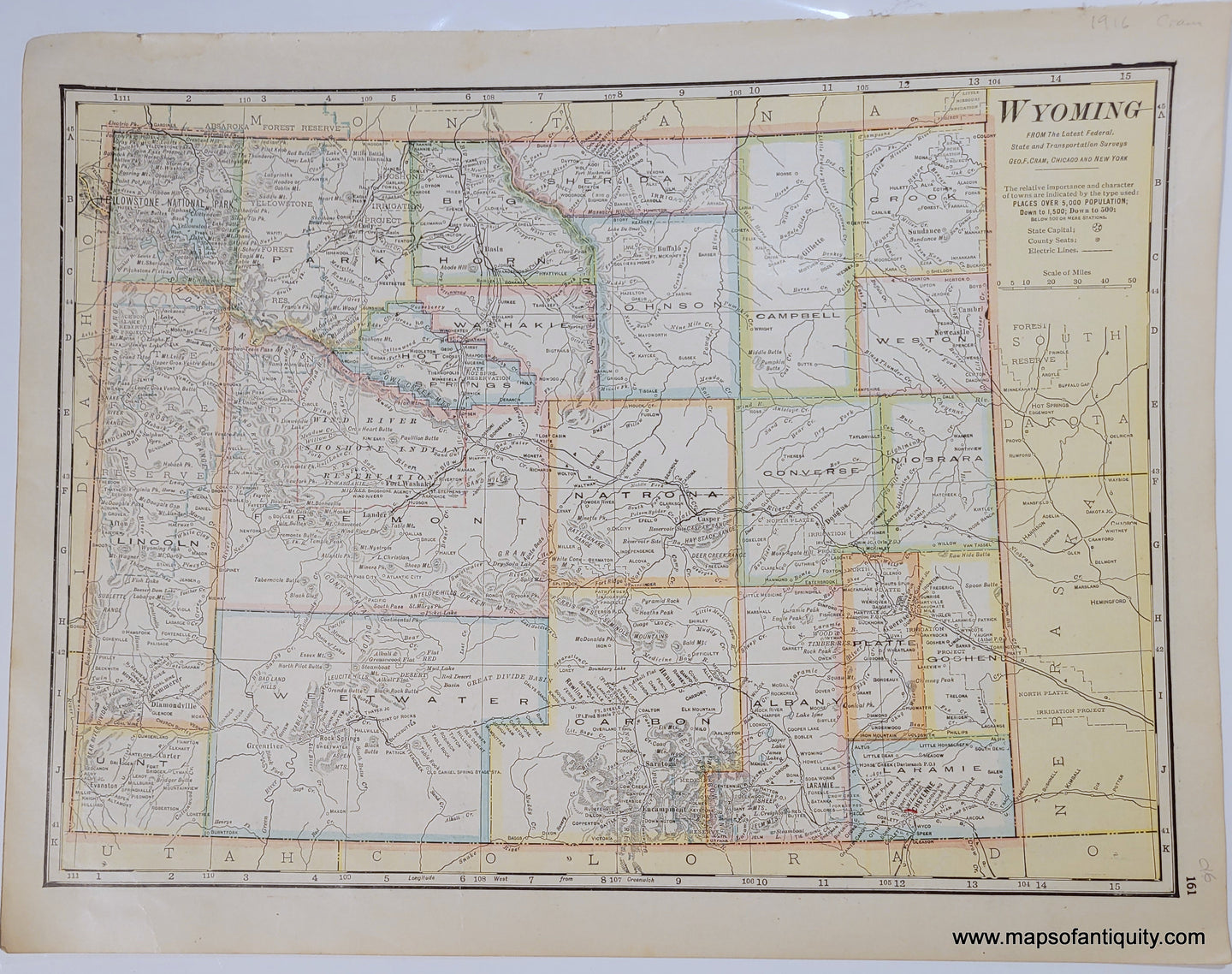 Antique map of Wyoming with original printed color. The color indicates the county borders and is in antique tones of green, pink, orange, yellow, and blue.